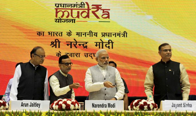 The Prime Minister, Shri Narendra Modi launching the Pradhan Mantri MUDRA Yojana, in New Delhi on April 08, 2015. 	The Union Minister for Finance, Corporate Affairs and Information & Broadcasting, Shri Arun Jaitley, the Minister of State for Finance, Shri Jayant Sinha and the secretary, Department of Financial Services (DFS), Ministry of Finance, Dr. Hasmukh Adhia are also seen.